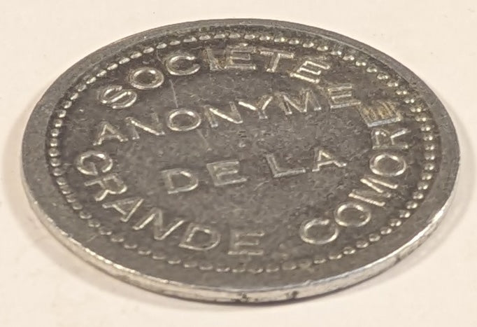 COMOROS, SOCIETE ANONYME DE LA ~ GRANDE COMORE ND (1915) ~ 25 Centimes Aluminum token ~ SOCIETE ANONYME DE LA GRANDE COMORE ~ BON DE REMBOURSABLE 25¢ ~ Lec-21, Gad-4, KN-Tn-1 ~ EF, some porosity