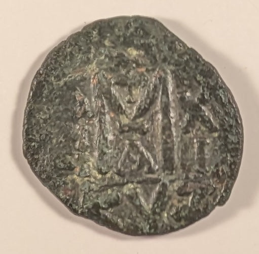 BYZANTINE, Maurice Tiberius ~ 582-602 AD ~ Æ Follis (11.37g) ~ Crowned facing bust. Unusual ending of name VRI. TBERP ~ Large M, Officina A, year 11, cross above KYZ in ex.. Cyzicus mint ~ SB-518, Ratto-1122 ~ aVF, o.c.