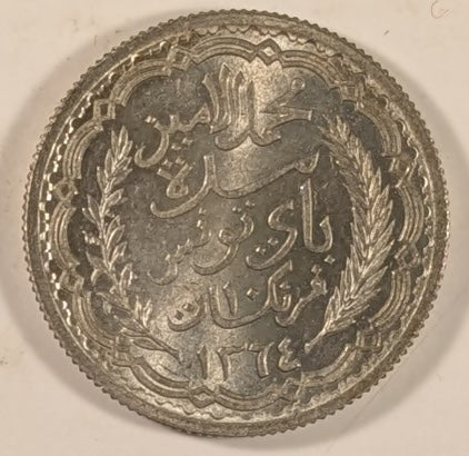 TUNISIA, French Protectorate with Muh’d ~ al-Amin Bey. 1364/1944 ~ 10 Francs ~ Rare two year type ~ Y-55a, KM-269, Lec-341 ~ Ch. BU, lightly toned
