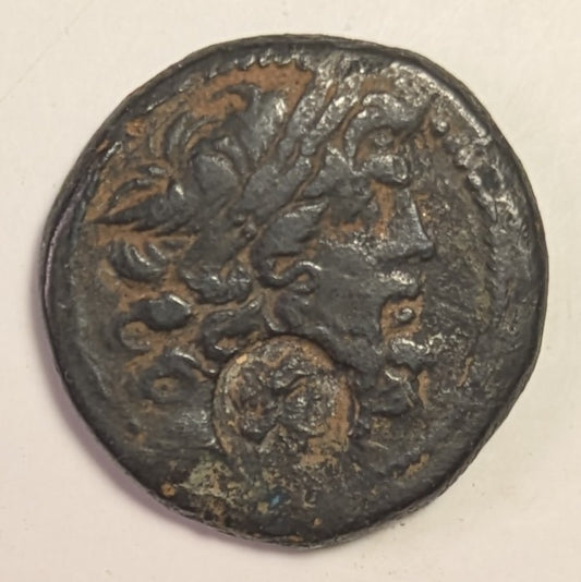 SYRIA, Seleucis and Pieria. Antioch. ~ Pseudo-autonomous. 1st century BC ~ Æ Tetrachalkon (23.5mm, 11.07g) ~ Laureate head of Zeus right ~ c/m: head of Cleopatra VII(?) right within oval incuse . ~ Zeus Nikephoros seated left, date in ex., but hard t